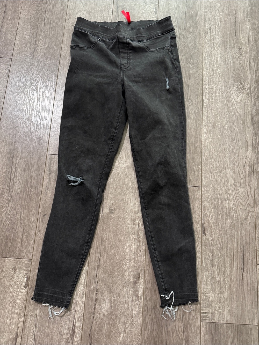 SPANX distressed skinny pull on black denim jeans M